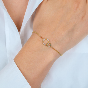 ZINZI zilver verguld armbandje verbonden met twee ringen een gezet met zirconia's - 2011438