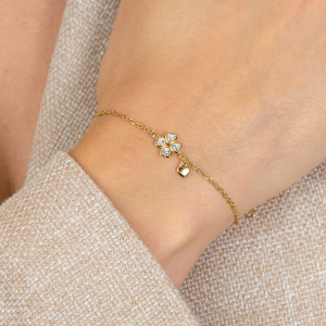 ZINZI zilver verguld armbandje verbonden met een klavertje vier met zirconia's - 2011439